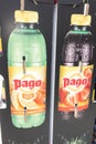 Pago fruit juice soda lemonade logo sign and brand text on shop advertising in market