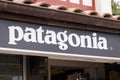 Patagonia logo brand and text sign on wall shop fashion clothes entrance store