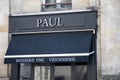 paul text wall sign and brand logo on door entrance facade french bakery take away