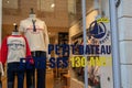 Petit Bateau child fashion store brand text and logo sign windows sticker 130 years