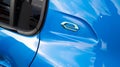 Peugeot 208 e-208 Electric car rear view back blue green e logo modern french