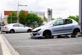 Peugeot 206 and Ford mondeo stealing car stolen without wheels parked in street Royalty Free Stock Photo