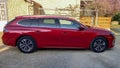 Peugeot 508 sw station wagon side view french car manufacturer red vehicle new model