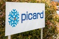 Picard logo brand and text sign on shop signage panel store French food market of