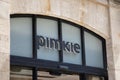 Pimkie logo brand and text sign on wall facade storefront fashion business