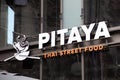 pitaya logo sign and brand text french facade entrance thai street restaurant takeaway