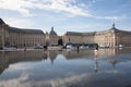 Bordeaux , Aquitaine / France - 10 30 2019 : bordeaux Place de la Bourse with in the mirror fountain Mirroir d`eau Bordeaux Royalty Free Stock Photo