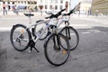 Police municipale bicycle patrols in french street of center town with ASVP sign Royalty Free Stock Photo