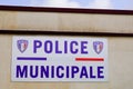 Police Municipale emblem logo and text sign front of French mayor police office in