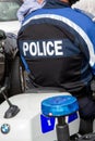 Police sign text on back man french policeman motorcyclist in france