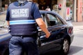 Policeman text sign walking man French national police in city street