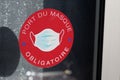 Port du masque obligatoire text french means mask required sign on windows store