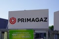 Primagaz logo sign and text of the brand on a cage for the presentation and sale of