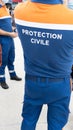 Protection Civile logo brand and text sign on back shirt man French securite civil