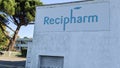 Recipharm logo and text sign front of factory Pharmaceutical outsourcing laboratory