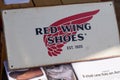 Red wing shoes logo sign and brand text on store facade clothing shop footwear made in