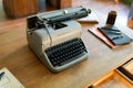 Remington vintage letter ritter model typewriter on ancient old wooden desk