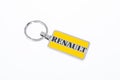 Renault brand sign and text logo key chain of car dealership automobiles store signage