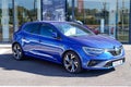 Renault megane rs line blue in dealer store park of dealership car in france