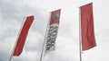 Renault trucks sign and red logo on flag front of dealership store bus van truck
