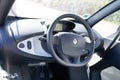 Renault Twizy mini electric car interior with dashboard and steering wheel of two