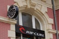 Rip curl logo and sign text front of shop surf skate store clothes boardshort Ripcurl