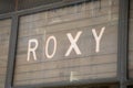 roxy logo brand and text sign on wall facade storefront fashion business Royalty Free Stock Photo