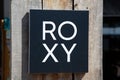 Roxy logo sign and brand text on store facade clothing shop entrance