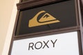 Roxy and quiksilver logo sign and brand text on store facade clothing shop entrance Royalty Free Stock Photo