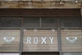 Roxy shop brand logo and text sign on windows entrance facade fashion surf store Royalty Free Stock Photo