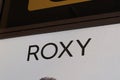 Roxy shop wall brand logo and text facade sign of fashion surf store Royalty Free Stock Photo