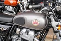 Royal Enfield logo and text sign on grey silver Indian motorbike steel tank of