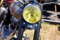 Royal Enfield motorcycle Closeup front headlight classic bullet fuel tank logo brand Royalty Free Stock Photo