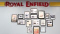 Royal Enfield motorcycle logo brand and text sign dealership store interior background Royalty Free Stock Photo