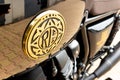 Royal Enfield 120 th motorcycle limited edition logo text and brand sign on petrol Royalty Free Stock Photo