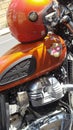 Royal Enfield vintage motorbike orange color with engine motor detail and colorful Royalty Free Stock Photo