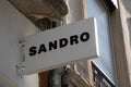Sandro fashion chain shop logo text and sign of French designer fashion brand facade