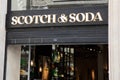 Scotch & Soda logo and sign front of store brand chain entrance facade Dutch fashion