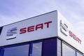 Seat logo sign and brand text on store dealership shop Spanish automobile manufacturer