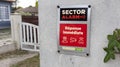 Sector logo sign and brand text of home alarm triggers in private house
