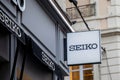 Seiko boutique text brand and sign logo chain entrance facade japanese clock shop