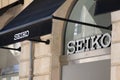 Seiko boutique text brand and sign logo facade of japanese clock shop company