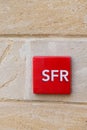 SFR logo sign and brand text on store french phone operator red office entrance