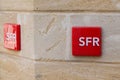 Sfr red text logo brand and sign front of french phone operator shop