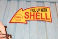 Shell oil company logo brand and text sign yellow arrow fill up ancient old panel Royalty Free Stock Photo