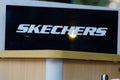 Skechers logo and text sign front of athletic footwear shop brand from United States