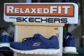 Skechers storefront logo and text sign advertising of athletic footwear brand from