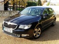 Skoda Superb family car parked in side front view