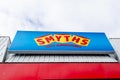 Smyths Toys Superstores logo brand and text sign on wall facade toys shop entrance