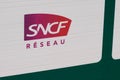 SNCF reseau logo brand and text sign on entrance station of National society of French